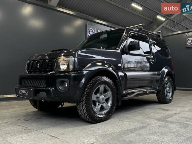 Черный Сузуки Джимни, объемом двигателя 1.33 л и пробегом 168 тыс. км за 12200 $, фото 5 на Automoto.ua