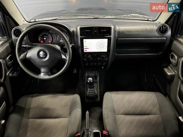 Черный Сузуки Джимни, объемом двигателя 1.33 л и пробегом 168 тыс. км за 12200 $, фото 27 на Automoto.ua