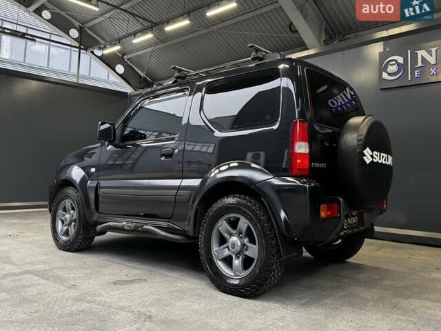 Черный Сузуки Джимни, объемом двигателя 1.33 л и пробегом 168 тыс. км за 12200 $, фото 7 на Automoto.ua