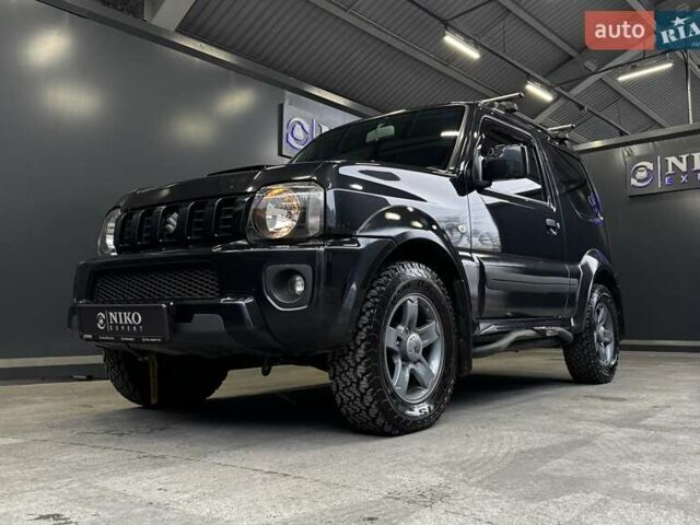 Черный Сузуки Джимни, объемом двигателя 1.33 л и пробегом 168 тыс. км за 12200 $, фото 4 на Automoto.ua