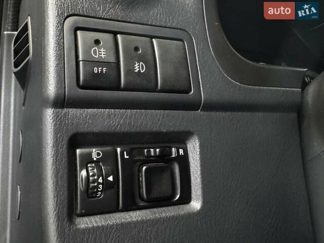 Черный Сузуки Джимни, объемом двигателя 1.33 л и пробегом 168 тыс. км за 12200 $, фото 30 на Automoto.ua