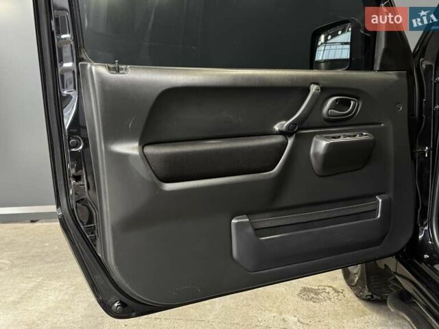 Черный Сузуки Джимни, объемом двигателя 1.33 л и пробегом 168 тыс. км за 12200 $, фото 26 на Automoto.ua