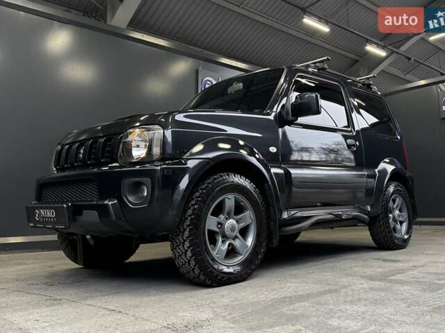 Черный Сузуки Джимни, объемом двигателя 1.33 л и пробегом 168 тыс. км за 12200 $, фото 6 на Automoto.ua