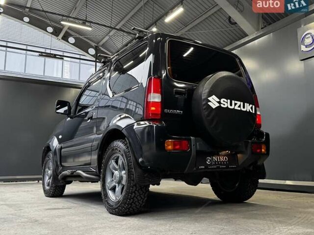 Черный Сузуки Джимни, объемом двигателя 1.33 л и пробегом 168 тыс. км за 12200 $, фото 12 на Automoto.ua