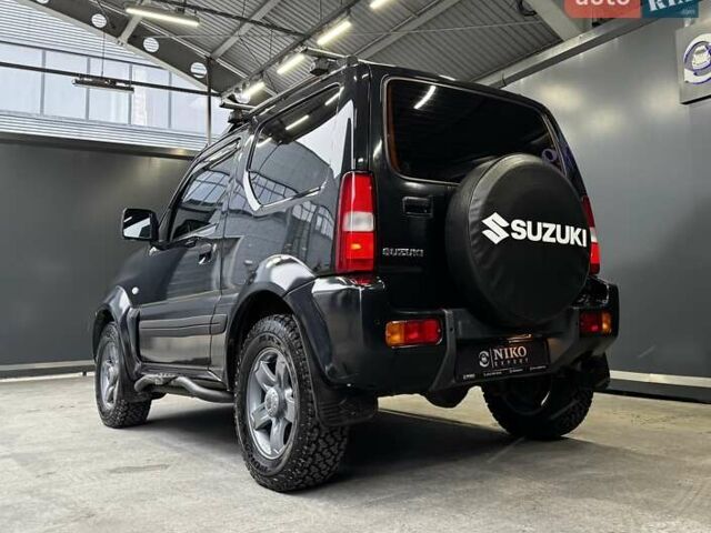 Черный Сузуки Джимни, объемом двигателя 1.33 л и пробегом 168 тыс. км за 12200 $, фото 11 на Automoto.ua