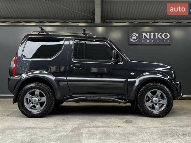 Черный Сузуки Джимни, объемом двигателя 1.33 л и пробегом 168 тыс. км за 12200 $, фото 14 на Automoto.ua
