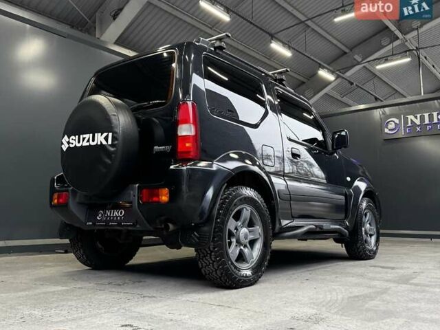 Черный Сузуки Джимни, объемом двигателя 1.33 л и пробегом 168 тыс. км за 12200 $, фото 19 на Automoto.ua