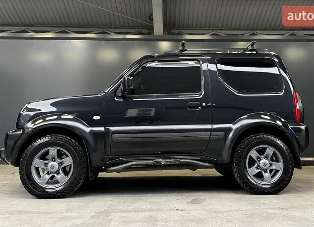 Черный Сузуки Джимни, объемом двигателя 1.33 л и пробегом 168 тыс. км за 12200 $, фото 13 на Automoto.ua