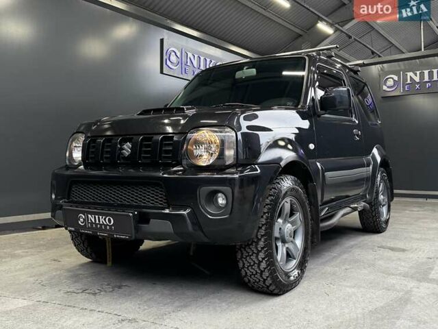 Черный Сузуки Джимни, объемом двигателя 1.33 л и пробегом 168 тыс. км за 12200 $, фото 1 на Automoto.ua