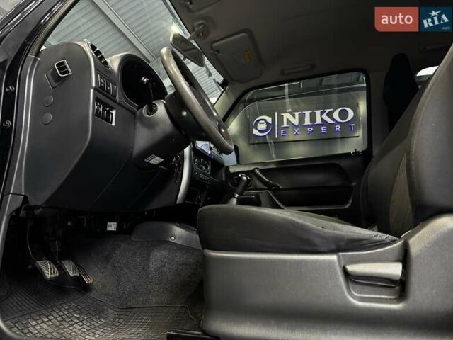 Черный Сузуки Джимни, объемом двигателя 1.33 л и пробегом 168 тыс. км за 12200 $, фото 31 на Automoto.ua