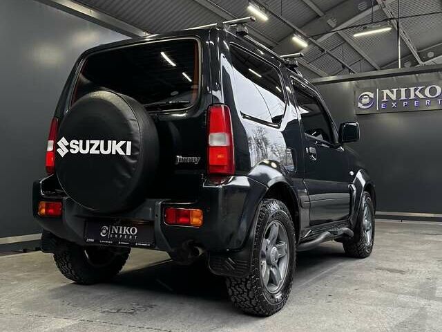 Черный Сузуки Джимни, объемом двигателя 1.33 л и пробегом 168 тыс. км за 12200 $, фото 16 на Automoto.ua
