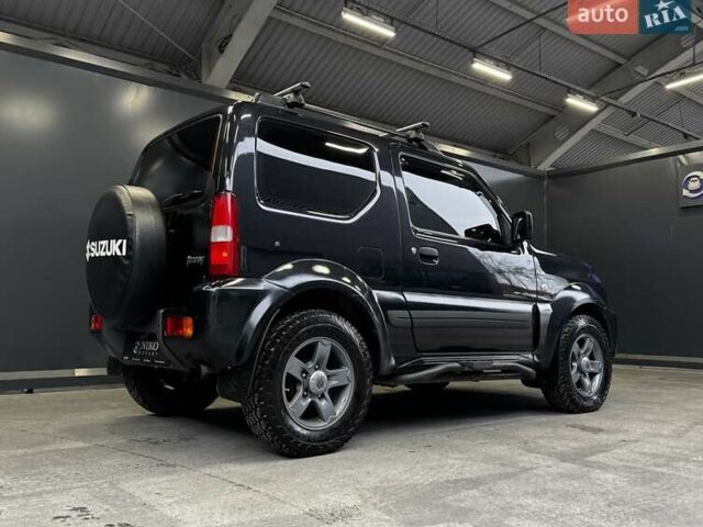 Черный Сузуки Джимни, объемом двигателя 1.33 л и пробегом 168 тыс. км за 12200 $, фото 20 на Automoto.ua