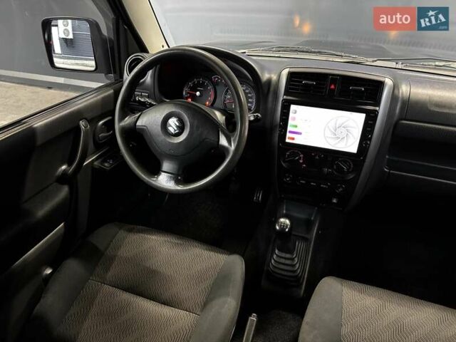 Черный Сузуки Джимни, объемом двигателя 1.33 л и пробегом 168 тыс. км за 12200 $, фото 36 на Automoto.ua