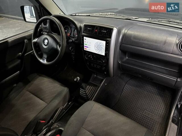 Черный Сузуки Джимни, объемом двигателя 1.33 л и пробегом 168 тыс. км за 12200 $, фото 35 на Automoto.ua