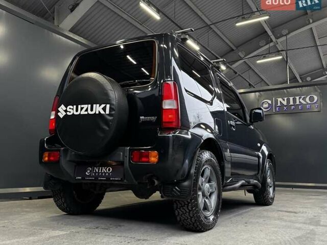 Черный Сузуки Джимни, объемом двигателя 1.33 л и пробегом 168 тыс. км за 12200 $, фото 17 на Automoto.ua