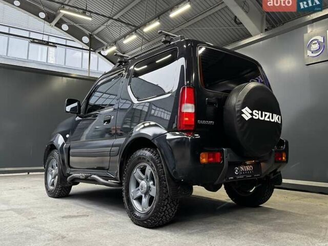 Черный Сузуки Джимни, объемом двигателя 1.33 л и пробегом 168 тыс. км за 12200 $, фото 9 на Automoto.ua