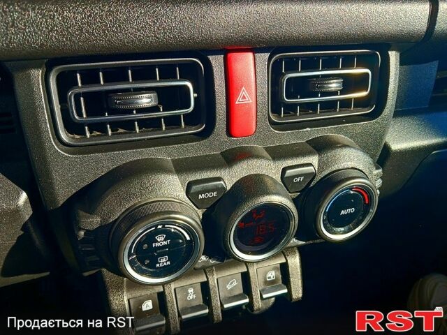 Чорний Сузукі Джімні, об'ємом двигуна 1.5 л та пробігом 50 тис. км за 21500 $, фото 7 на Automoto.ua