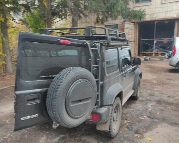 Чорний Сузукі Джімні, об'ємом двигуна 1.46 л та пробігом 63 тис. км за 19000 $, фото 2 на Automoto.ua