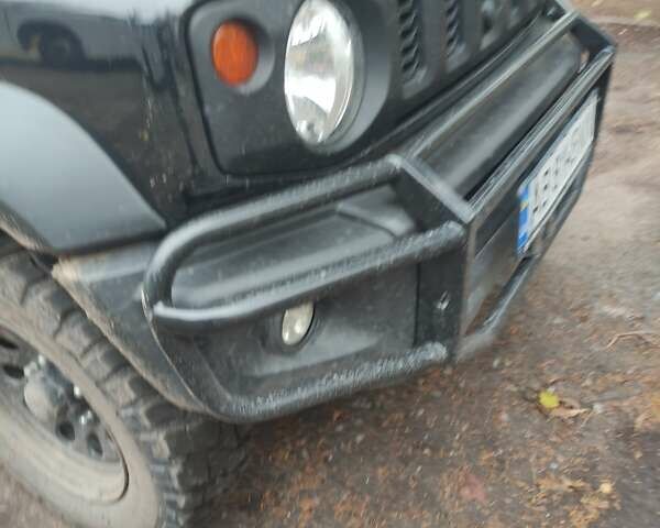 Чорний Сузукі Джімні, об'ємом двигуна 1.46 л та пробігом 63 тис. км за 19000 $, фото 8 на Automoto.ua