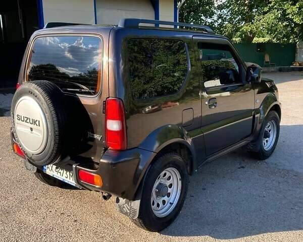 Коричневый Сузуки Джимни, объемом двигателя 1.3 л и пробегом 110 тыс. км за 16000 $, фото 7 на Automoto.ua