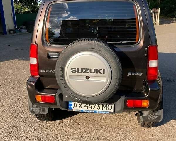 Коричневый Сузуки Джимни, объемом двигателя 1.3 л и пробегом 110 тыс. км за 16000 $, фото 1 на Automoto.ua