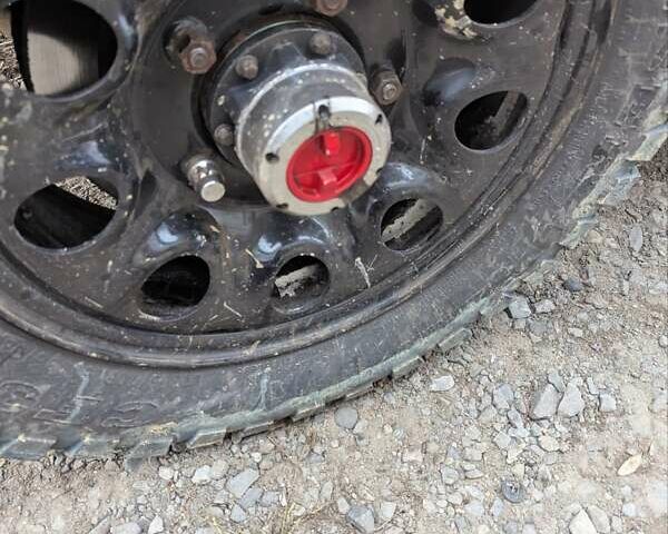 Красный Сузуки Джимни, объемом двигателя 1.3 л и пробегом 185 тыс. км за 5999 $, фото 4 на Automoto.ua