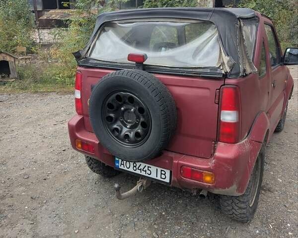 Красный Сузуки Джимни, объемом двигателя 1.3 л и пробегом 185 тыс. км за 5999 $, фото 6 на Automoto.ua