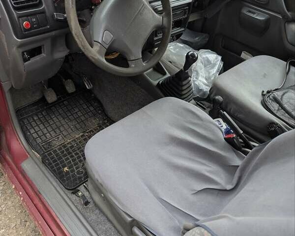 Красный Сузуки Джимни, объемом двигателя 1.3 л и пробегом 185 тыс. км за 5999 $, фото 5 на Automoto.ua