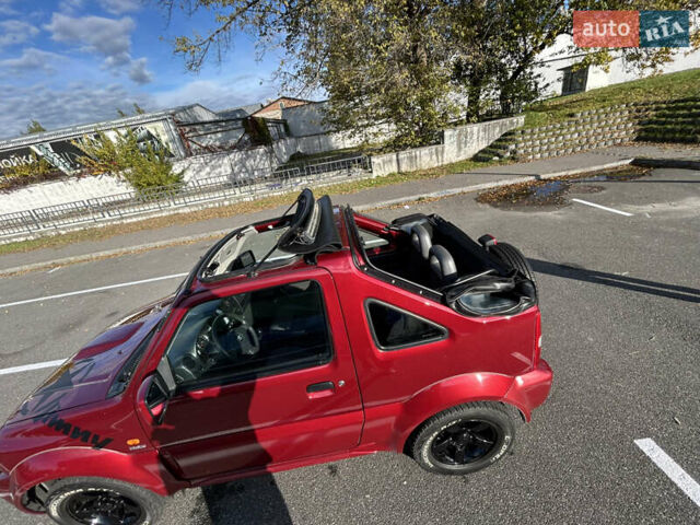 Сузуки Джимни 2006 в Киеве на Automoto.ua Красный Сузуки Джимни, объемом двигателя 1.5 л и пробегом 221 тыс. км за 12000 $, фото 23 на Automoto.ua