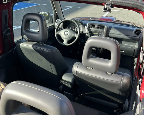 Сузуки Джимни 2006 в Киеве на Automoto.ua Красный Сузуки Джимни, объемом двигателя 1.5 л и пробегом 221 тыс. км за 12000 $, фото 18 на Automoto.ua