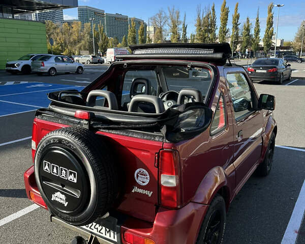 Сузуки Джимни 2006 в Киеве на Automoto.ua Красный Сузуки Джимни, объемом двигателя 1.5 л и пробегом 221 тыс. км за 12000 $, фото 9 на Automoto.ua