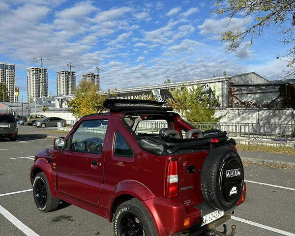 Сузуки Джимни 2006 в Киеве на Automoto.ua Красный Сузуки Джимни, объемом двигателя 1.5 л и пробегом 221 тыс. км за 12000 $, фото 7 на Automoto.ua