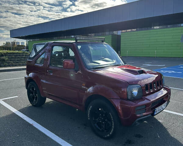 Сузуки Джимни 2006 в Киеве на Automoto.ua Красный Сузуки Джимни, объемом двигателя 1.5 л и пробегом 221 тыс. км за 12000 $, фото 5 на Automoto.ua