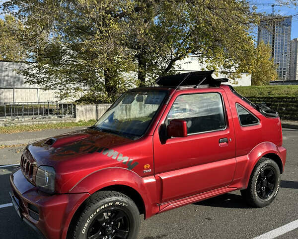 Сузуки Джимни 2006 в Киеве на Automoto.ua Красный Сузуки Джимни, объемом двигателя 1.5 л и пробегом 221 тыс. км за 12000 $, фото 6 на Automoto.ua