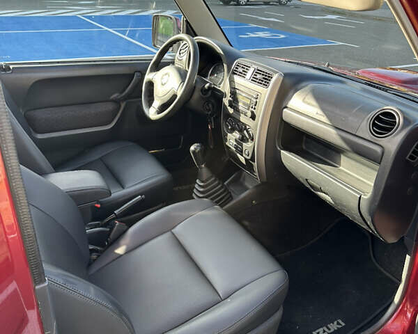 Сузуки Джимни 2006 в Киеве на Automoto.ua Красный Сузуки Джимни, объемом двигателя 1.5 л и пробегом 221 тыс. км за 12000 $, фото 11 на Automoto.ua