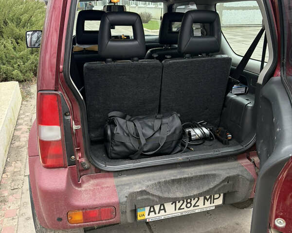 Червоний Сузукі Джімні, об'ємом двигуна 1.33 л та пробігом 114 тис. км за 9500 $, фото 7 на Automoto.ua