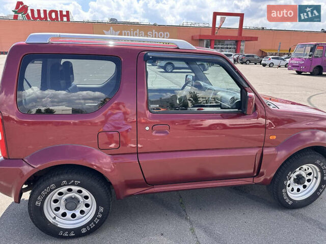 Красный Сузуки Джимни, объемом двигателя 1.33 л и пробегом 134 тыс. км за 9200 $, фото 5 на Automoto.ua