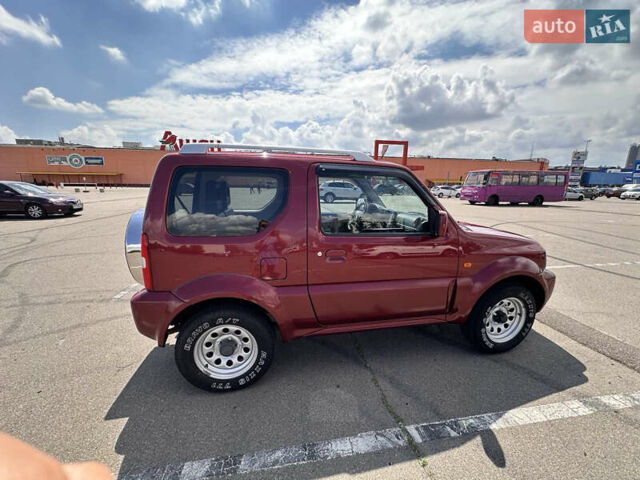 Красный Сузуки Джимни, объемом двигателя 1.33 л и пробегом 134 тыс. км за 9200 $, фото 4 на Automoto.ua