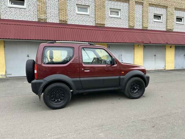 Красный Сузуки Джимни, объемом двигателя 1.3 л и пробегом 174 тыс. км за 8500 $, фото 16 на Automoto.ua