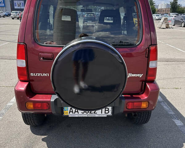 Красный Сузуки Джимни, объемом двигателя 1.33 л и пробегом 134 тыс. км за 9200 $, фото 12 на Automoto.ua