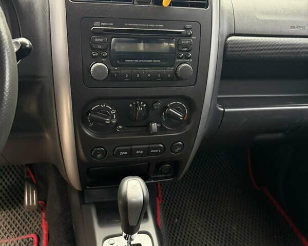 Червоний Сузукі Джімні, об'ємом двигуна 1.33 л та пробігом 114 тис. км за 9500 $, фото 4 на Automoto.ua