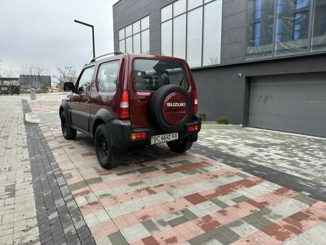 Красный Сузуки Джимни, объемом двигателя 1.3 л и пробегом 174 тыс. км за 8500 $, фото 3 на Automoto.ua
