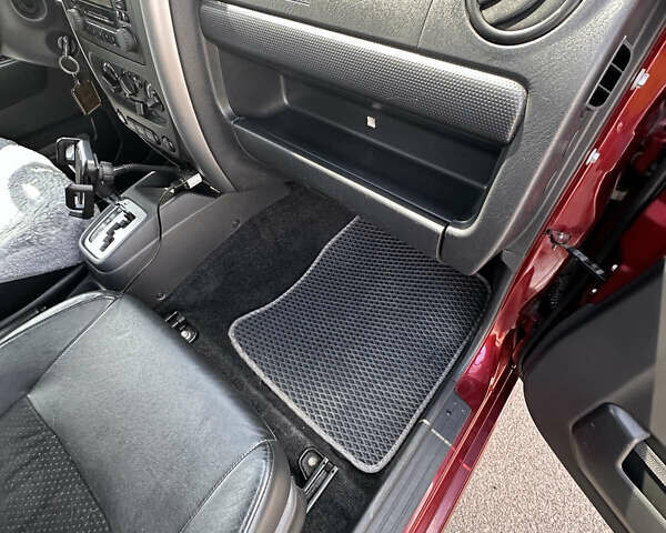 Красный Сузуки Джимни, объемом двигателя 1.33 л и пробегом 134 тыс. км за 9200 $, фото 8 на Automoto.ua