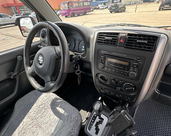 Красный Сузуки Джимни, объемом двигателя 1.33 л и пробегом 134 тыс. км за 9200 $, фото 9 на Automoto.ua