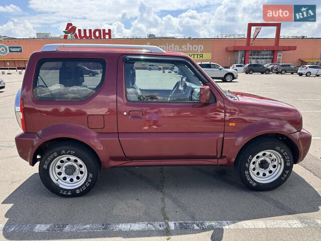 Красный Сузуки Джимни, объемом двигателя 1.33 л и пробегом 134 тыс. км за 9200 $, фото 3 на Automoto.ua