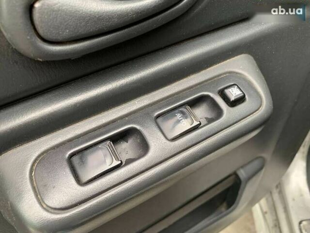 Сузуки Джимни, объемом двигателя 1.3 л и пробегом 94 тыс. км за 10790 $, фото 13 на Automoto.ua