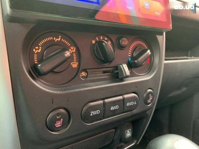 Сузуки Джимни, объемом двигателя 1.3 л и пробегом 94 тыс. км за 10790 $, фото 18 на Automoto.ua