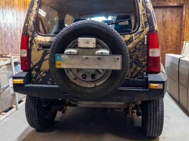 Сузуки Джимни 2009 в Киеве на Automoto.ua Желтый Сузуки Джимни, объемом двигателя 1.3 л и пробегом 45 тыс. км за 12800 $, фото 2 на Automoto.ua