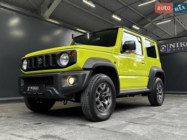 Желтый Сузуки Джимни, объемом двигателя 1.5 л и пробегом 149 тыс. км за 17900 $, фото 5 на Automoto.ua