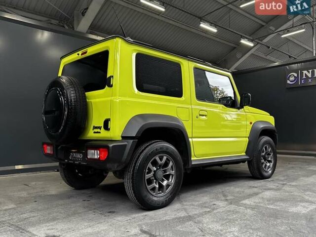 Желтый Сузуки Джимни, объемом двигателя 1.5 л и пробегом 149 тыс. км за 17900 $, фото 18 на Automoto.ua